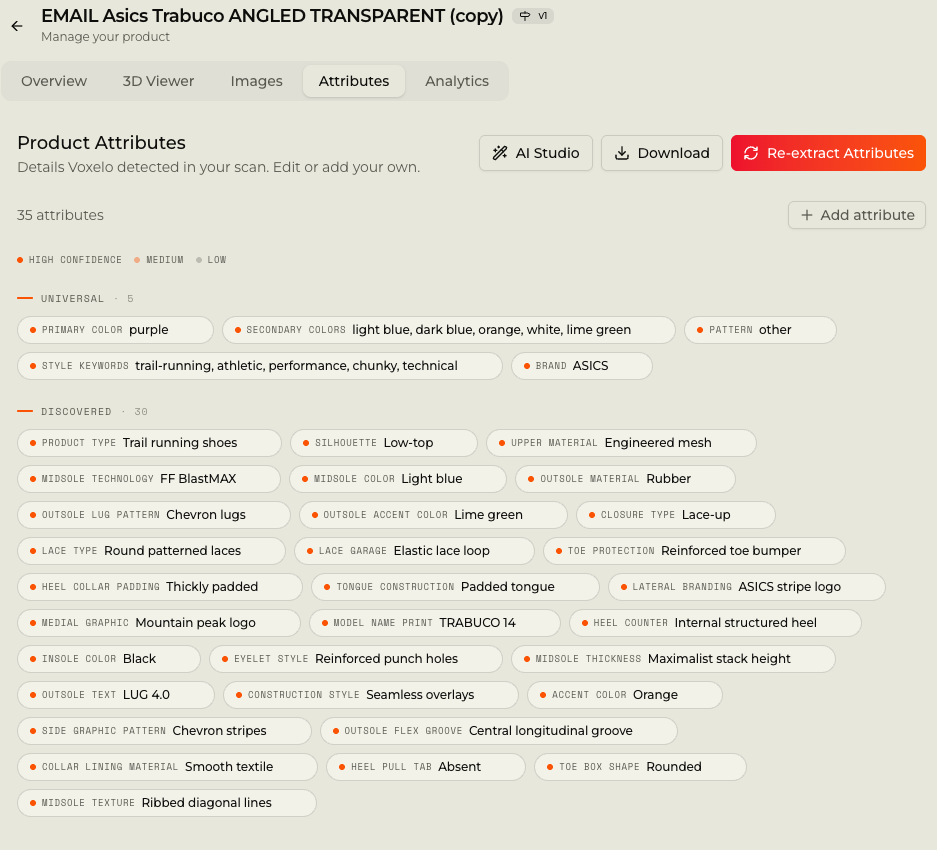 The Voxelo product attributes panel showing 35 attributes detected from a scan of an ASICS Trabuco trail running shoe, grouped into universal and discovered, each with a confidence marker
